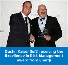 Dustin Kaiser (left) receiving the Excellence in Risk Management award from Energi